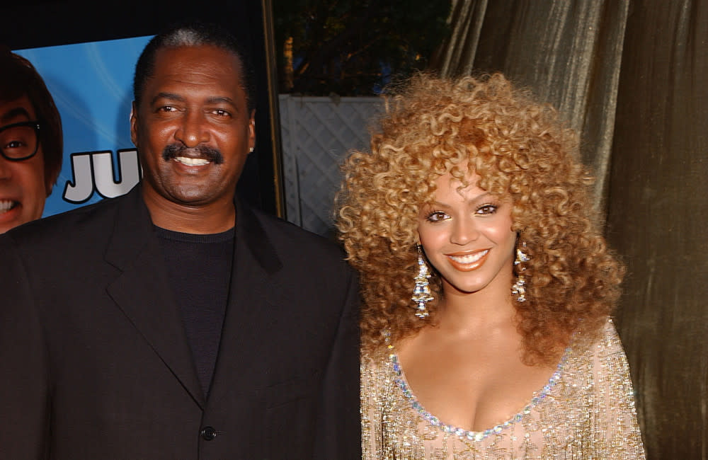 Beyonce and her dad Mathew Knowles - July 2002 - Austin Powers In Goldmember premiere - CA - Avalon