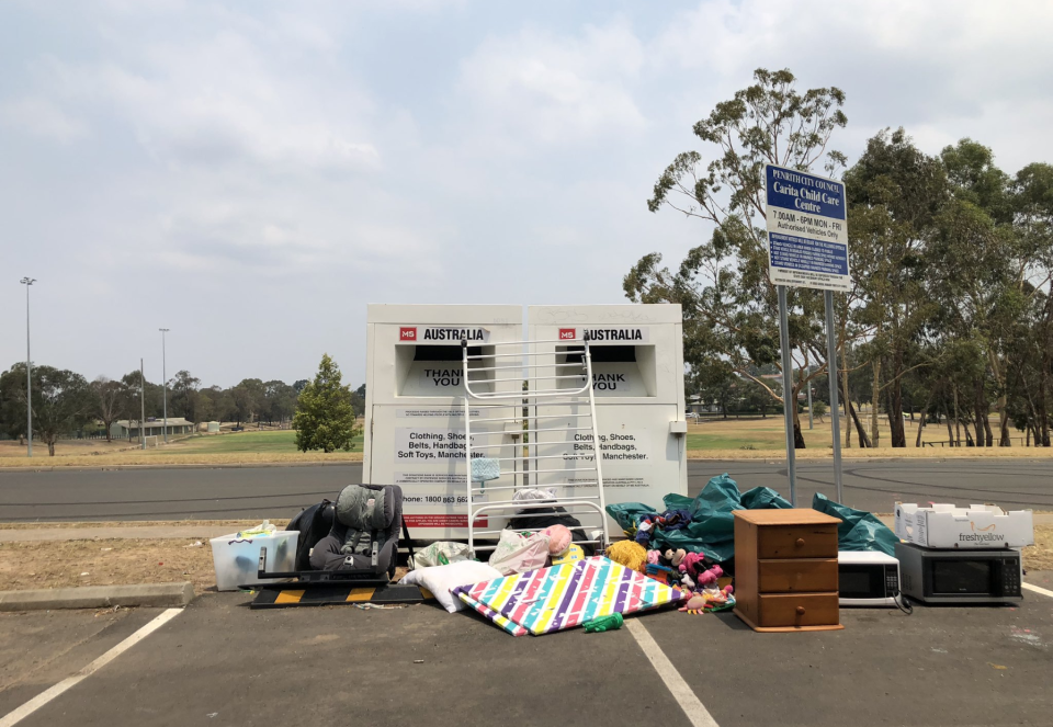 A pile of household products outside a MS Australia charity bin in Penrith. 