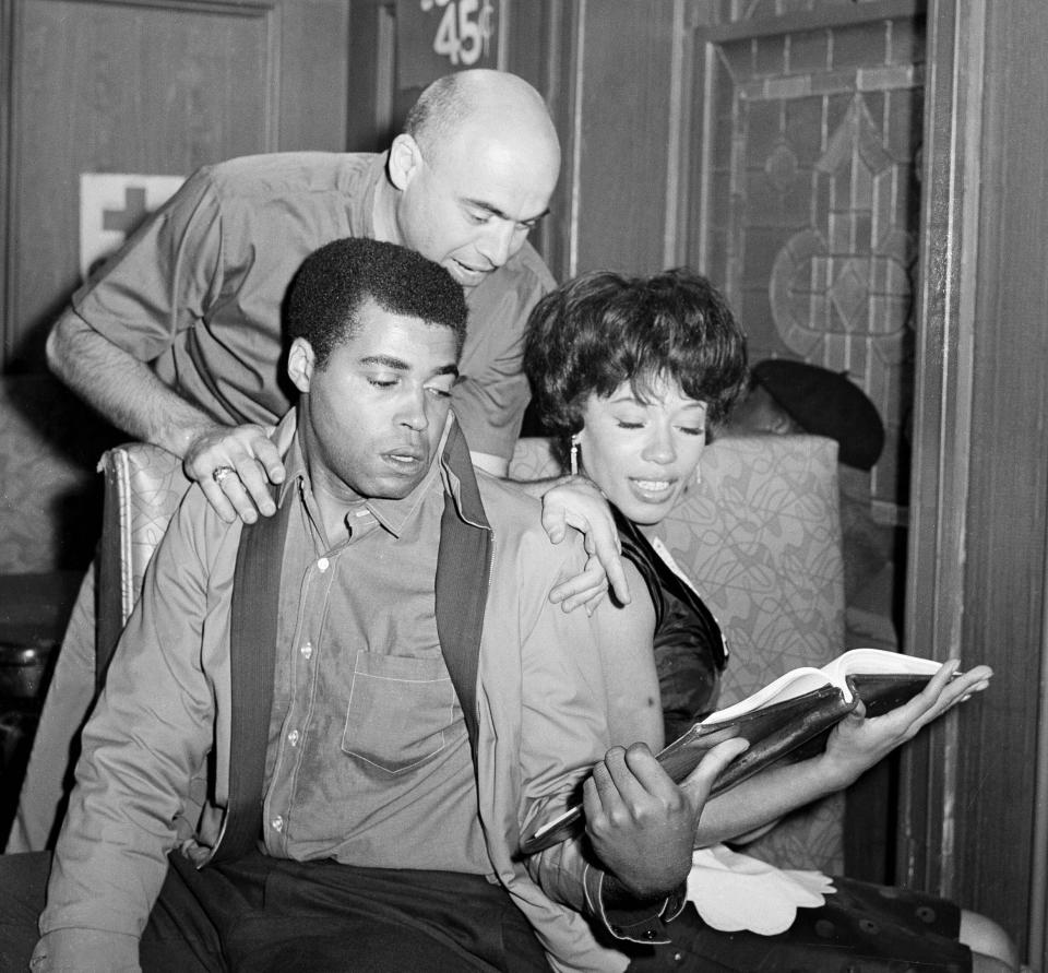 1963: Director Tom Gries looks over the shoulders as actors James Earl Jones and Diana Sands, go over their lines. Jones and Sands, who play the roles of young lovers in 