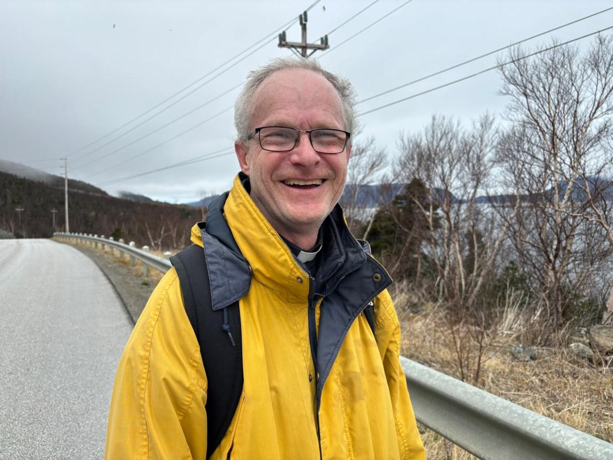 Bishop Bart Van Roijen walked from York Harbour to Corner Brook on Monday, which spans about the distance of the Gaza Strip. He said he was walking in solidarity with those suffering through the Hamas-Israel War, and calling for a ceasefire in the region. (Amy Feehan/CBC - image credit)