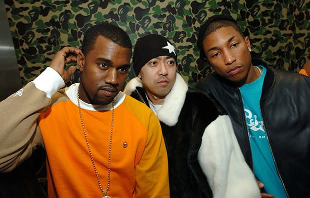 Kanye West, Nigo, and Pharrell at the A Bathing Ape store opening in 2005. Photo by Theo Wargo/WireImage for Bathing Ape/Nowhere CO.,LTD.
