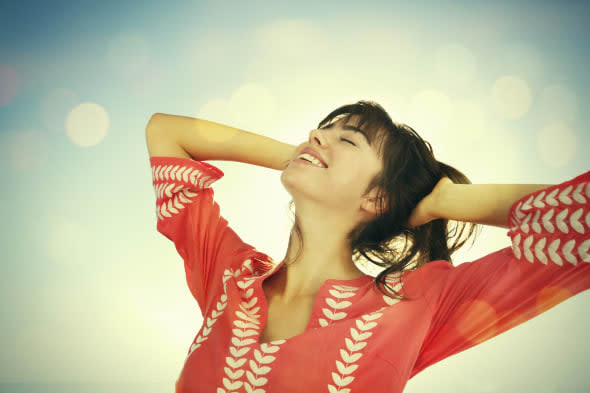 Portrait of young woman on the beach