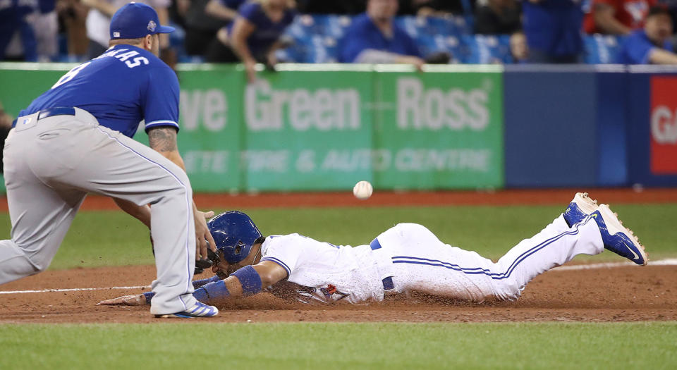 Devon Travis has had a rough start to the year, but he does some of the little things that help the Blue Jays win. (Photo by Tom Szczerbowski/Getty Images)