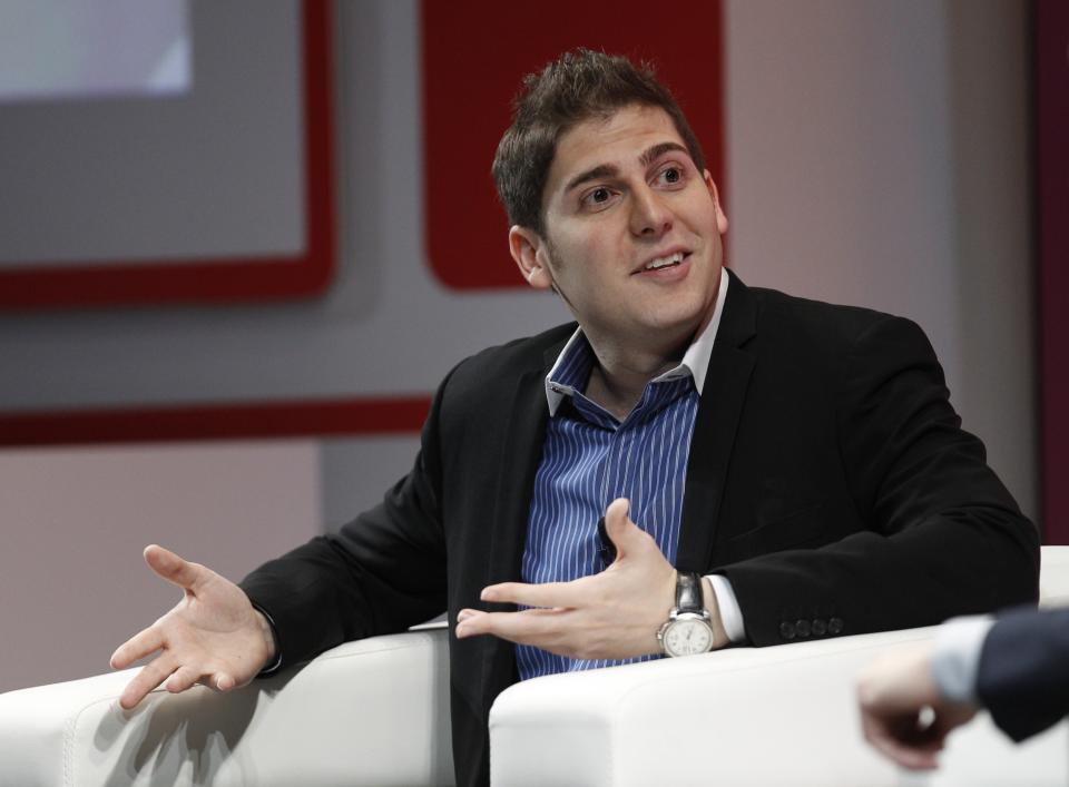 Facebook co-founder Eduardo Saverin speaks at the Wall Street Journal's Unleashing Innovation conference in Singapore February 21, 2013. REUTERS/Edgar Su (SINGAPORE - Tags: SCIENCE TECHNOLOGY BUSINESS)