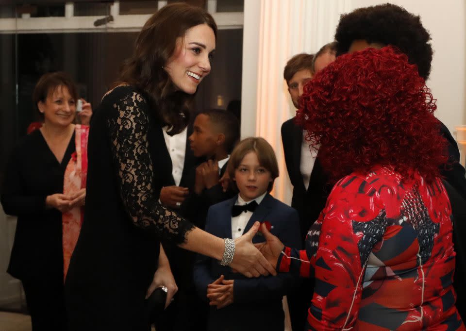 Kate beamed as she met with families at the event. Photo: Getty Images
