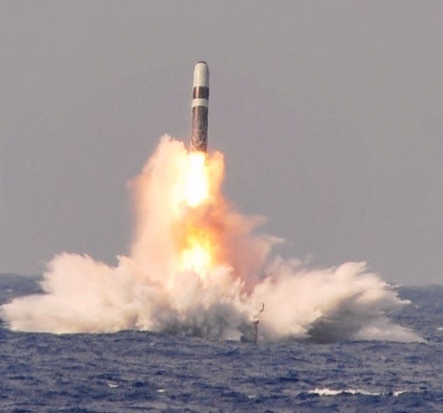 A Trident II D-5 ballistic missile launches from the Ohio-class ballistic missile submarine USS West Virginia in the Atlantic Ocean during a missile test.