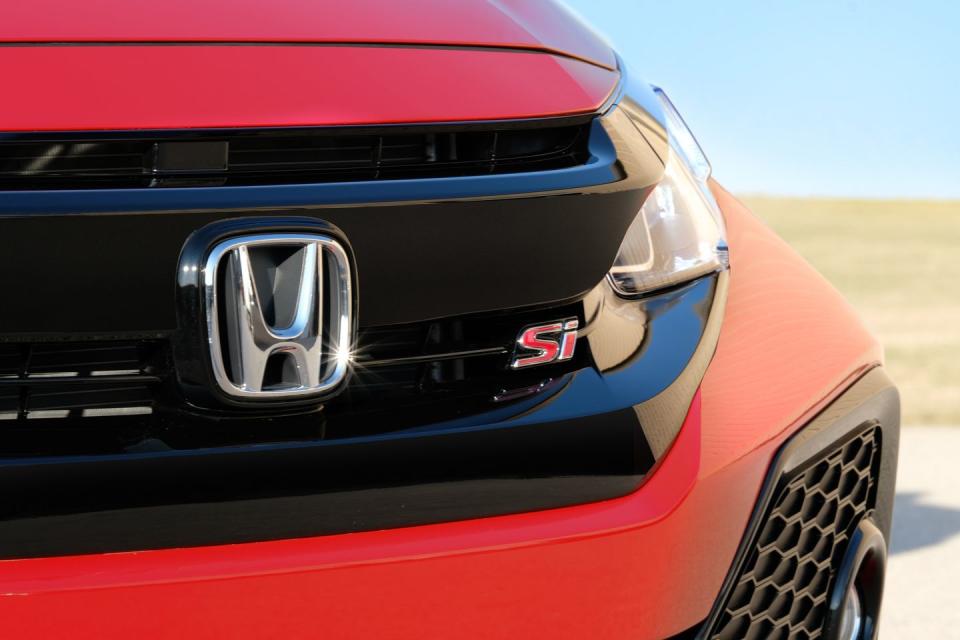 <p>For as wild as the Si’s styling is, its badging is remarkably discreet. There is only a small red-colored Si label in the grille and another on the trunklid.</p>