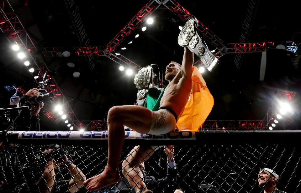 McGregor became the UFC' first ever double champion in 2016 Photo: Getty Images