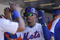 New York Mets' Francisco Lindor celebrates after scoring off an an RBI-single Daniel Vogelbach in the first inning of game one of a double header baseball game Atlanta Braves, Saturday, Aug. 6, 2022, in New York. (AP Photo/Mary Altaffer)