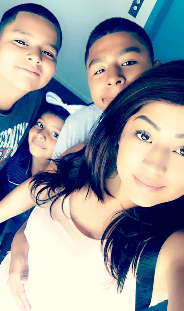 Hernandez with her three children