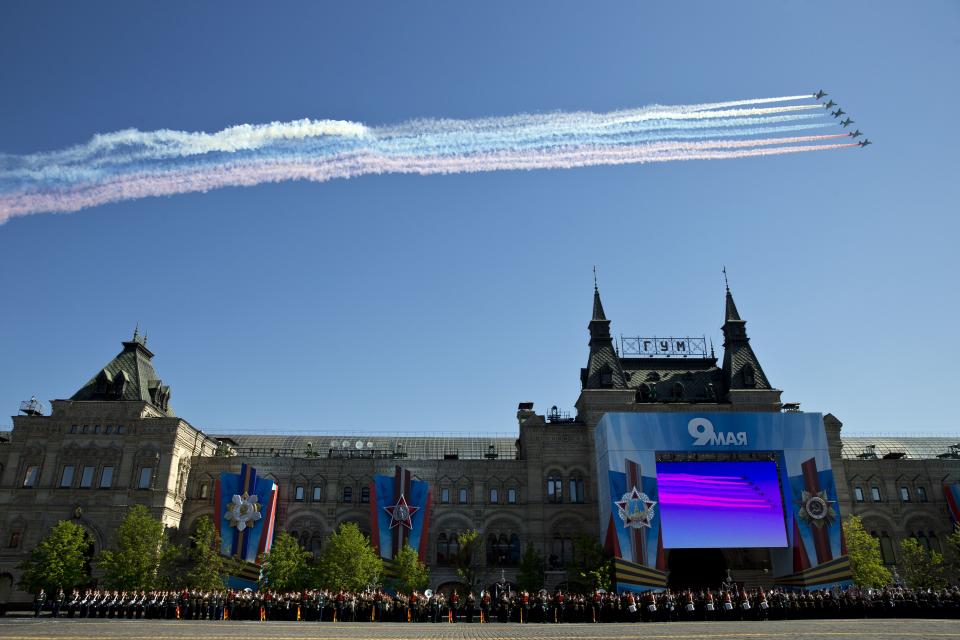 Russian air force Su-25 jets fly during the Victory Day Parade, which commemorates the 1945 defeat of Nazi Germany in Moscow, Russia, Friday, May 9, 2014. Thousands of Russian troops march on Red Square in the annual Victory Day parade in a proud display of the nation's military might amid escalating tensions over Ukraine. (AP Photo/Pavel Golovkin)