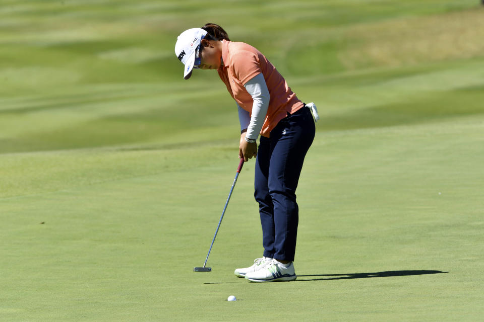 Nasa Hataoka, of Japan, sinks her putt on the 8th green during the second round of the LPGA Walmart NW Arkansas Championship golf tournament, Saturday, Sept. 25, 2021, in Rogers, Ark. (AP Photo/Michael Woods)