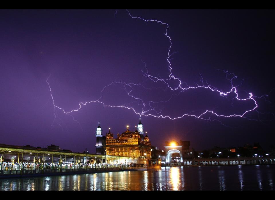  Lightning flashes over the Golden temple during the storm on April 29, 2012 in Amritsar, India. (Photo by Munish Byala/Hindustan Times via Getty Images)