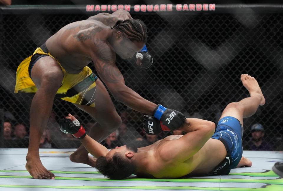 NEW YORK, NEW YORK - NOVEMBER 12: (L-R) Ryan Spann knocks out Dominick Reyes during the UFC 281 event at Madison Square Garden on November 12, 2022 in New York City. (Photo by Cooper Neill/Zuffa LLC)