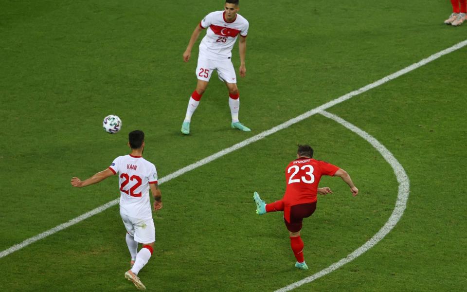 Shaqiri doubles Switzerland's lead with what we are contractually obliged to describe as a 'trademark Shaqiri strike'  - Naomi Baker/Pool via AP