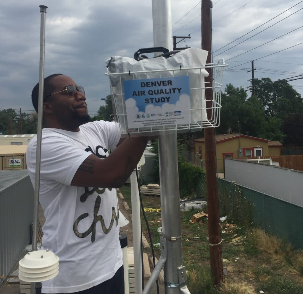 James Harris installs ambient air monitors to measure neighborhood air quality.