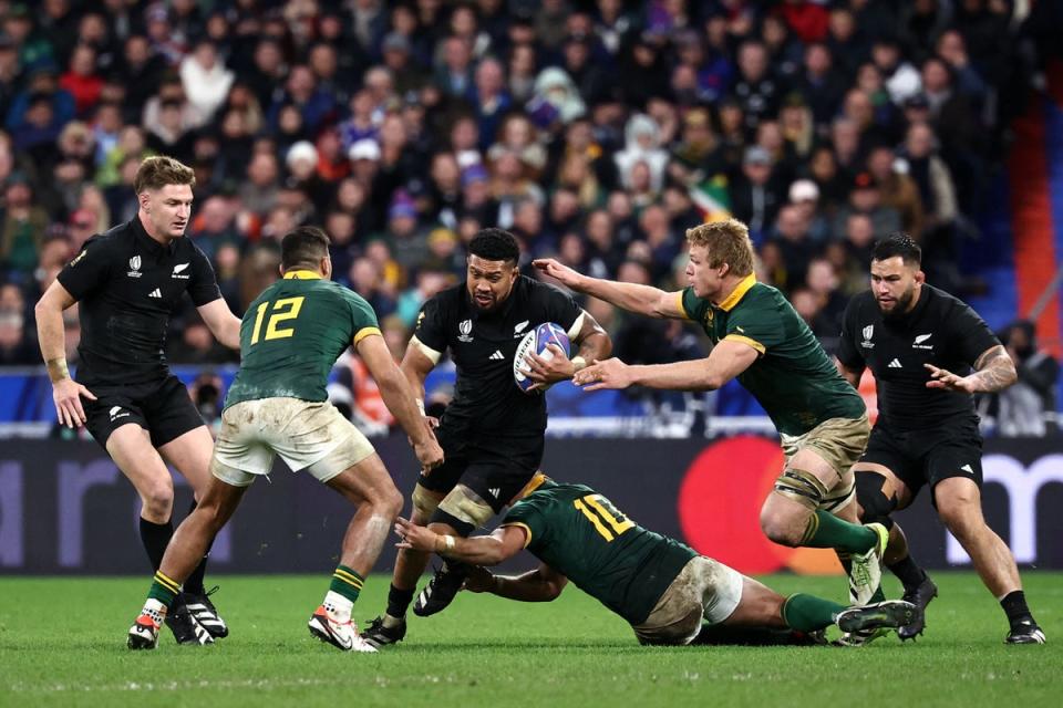 New Zealand’s number eight Ardie Savea is tackled by South Africa’s fly-half Handre Pollard (AFP)