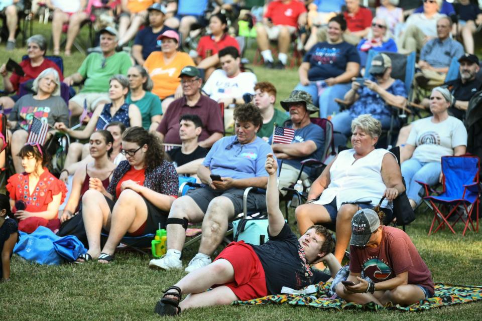 Spectators attending the Oak Ridge Community Band's 80th annual 4th of July concert at A.K. Bissell Park on Thursday, July 4, 2024 in Oak Ridge, Tenn.