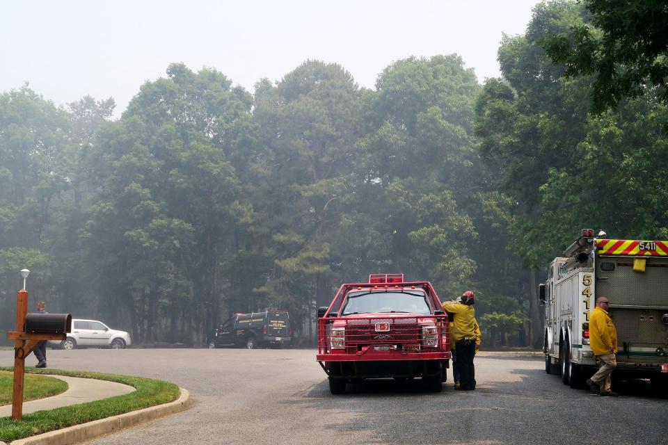 Smoke still fills the air on Pamela Court in Jackson Wednesday morning, June 7, 2023.  