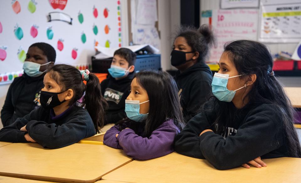 Scarlett Barrera, Rosemary Gonzalez and Stephanie Hernandez, who were students at Rocketship Nashville Northeast Elementary at the time, listen to their teacher during class on Nov. 23, 2021.