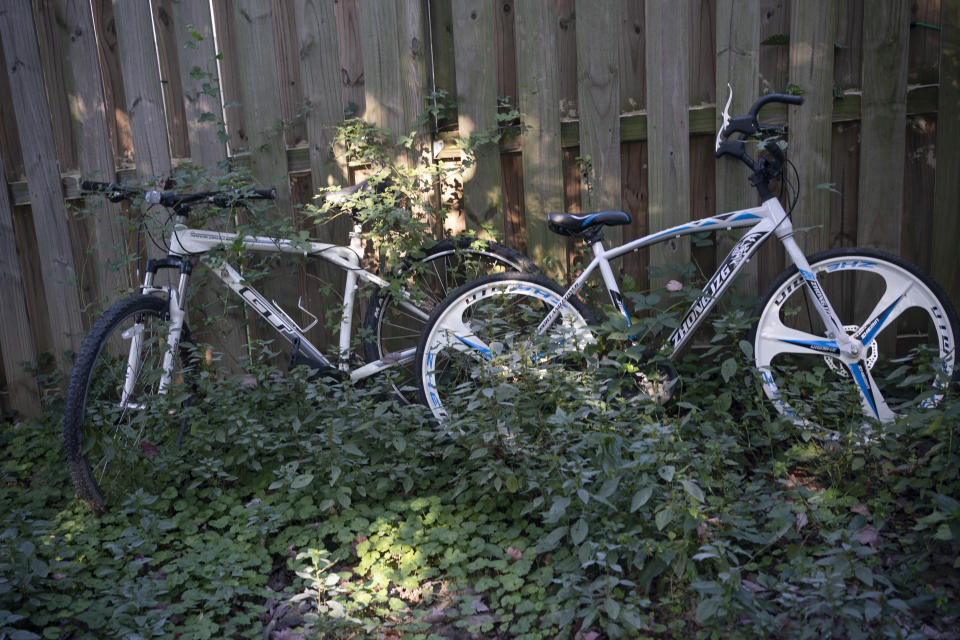 Bicycles that belonged to Charles Thomas sit in the backyard of his home in District Heights, Md., on Wednesday, Sept. 21, 2022. Thomas had hoped to take rides with his son. (AP Photo/Wong Maye-E)