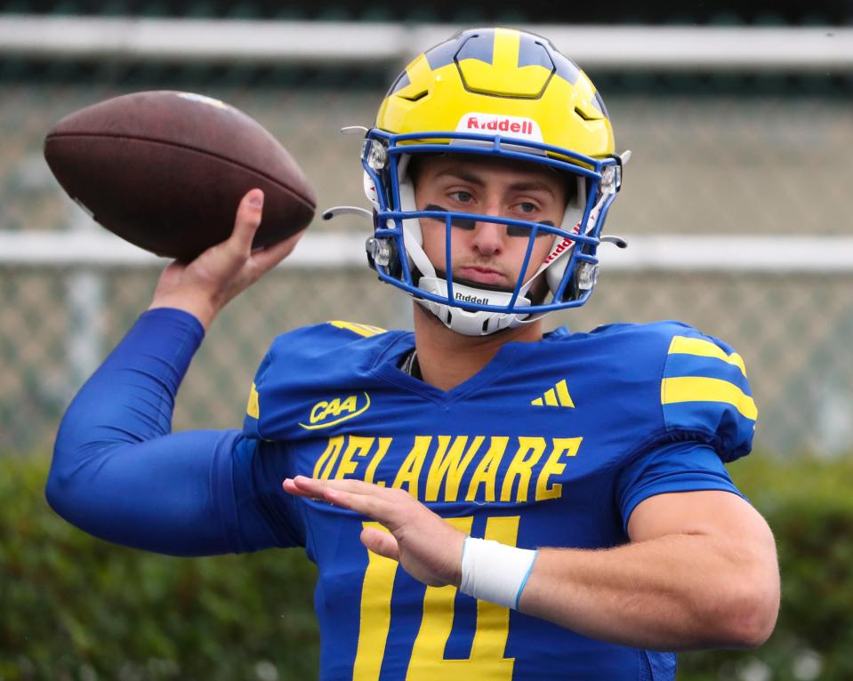 Delaware quarterback Ryan O'Connor warms up before the Blue Hens take on Duquesne, Saturday, Oct. 7, 2023 at Delaware Stadium.