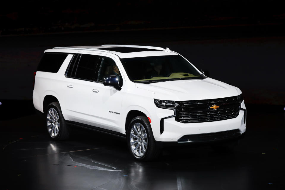 The 2021 Chevrolet Suburban Premier is unveiled in Detroit, Tuesday, Dec. 10, 2019. Global concerns about climate change are not stopping General Motors from making hulking SUVs for U.S. drivers. GM on Tuesday rolled out the next generation of its big truck-based SUVs with more space and features. (AP Photo/Paul Sancya)