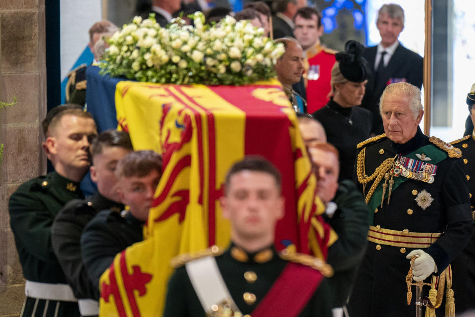 From left, King Charles III, Princess Anne, Prince Andrew, Camilla the Queen Consort and Tim Laurence during a Service of Prayer and Reflection for the Life of Queen Elizabeth II at St Giles' Cathedral, Edinburgh, Monday, Sept. 12, 2022. (Jane Barlow/Pool Photo via AP)