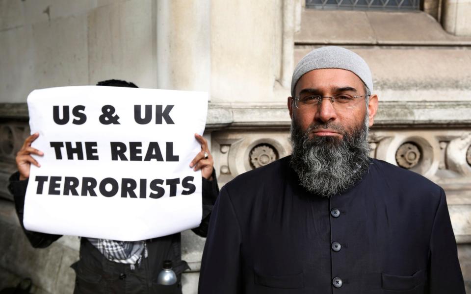 Demonstrator Anjem Choudary, protests in support of Islamist cleric Abu Hamza al-Masri - Credit:  LUKE MACGREGOR/Reuters