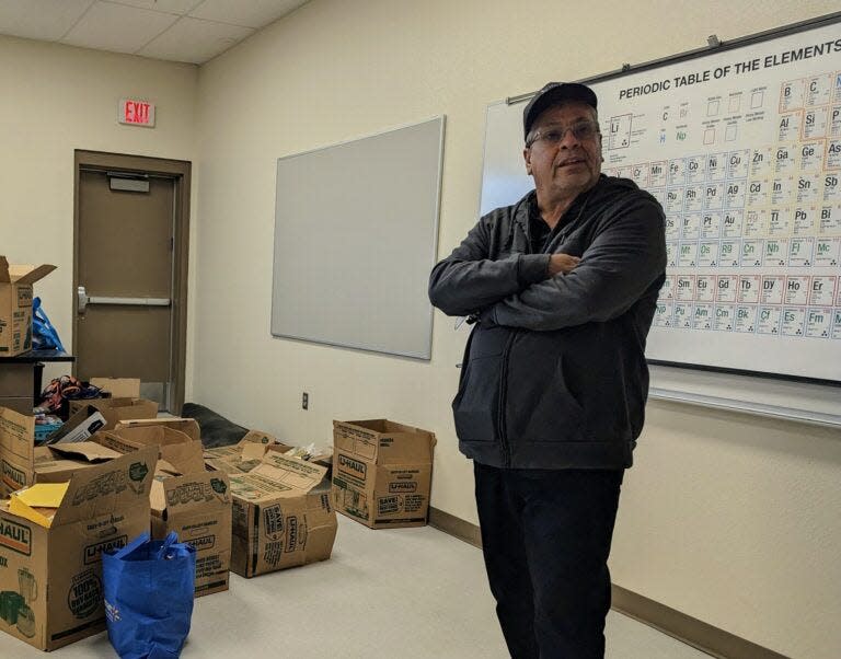 Darrell “Brownie” Eagle Bull stands in a science classroom at Lakota Tech High School. The room was empty as of Nov. 14, 2023, due to a lack of teachers.