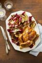 <p>Citrusy roast chicken and colorful radicchio salad makes a celebratory main that's perfect for the holiday.</p><p><em><a href="https://www.goodhousekeeping.com/food-recipes/a25323997/orange-ginger-roast-chicken-with-fennel-and-radicchio-salad-recipe/" rel="nofollow noopener" target="_blank" data-ylk="slk:Get the recipe for Orange-Ginger Roast Chicken with Fennel and Radicchio Salad »;elm:context_link;itc:0;sec:content-canvas" class="link ">Get the recipe for Orange-Ginger Roast Chicken with Fennel and Radicchio Salad »</a></em></p>