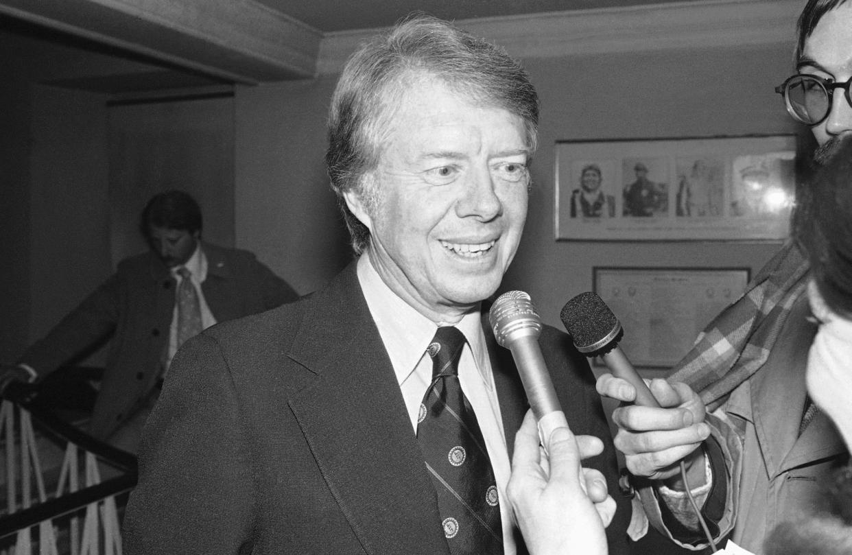 Democratic presidential candidate and former governor of Georgia Jimmy Carter answers questions at a gathering at the Unitarian Church of All Souls on Lexington Ave. at 80th St., on Jan. 9, 1976, in New York. The presidential hopeful spoke to the gathering during a campaign swing in New York.