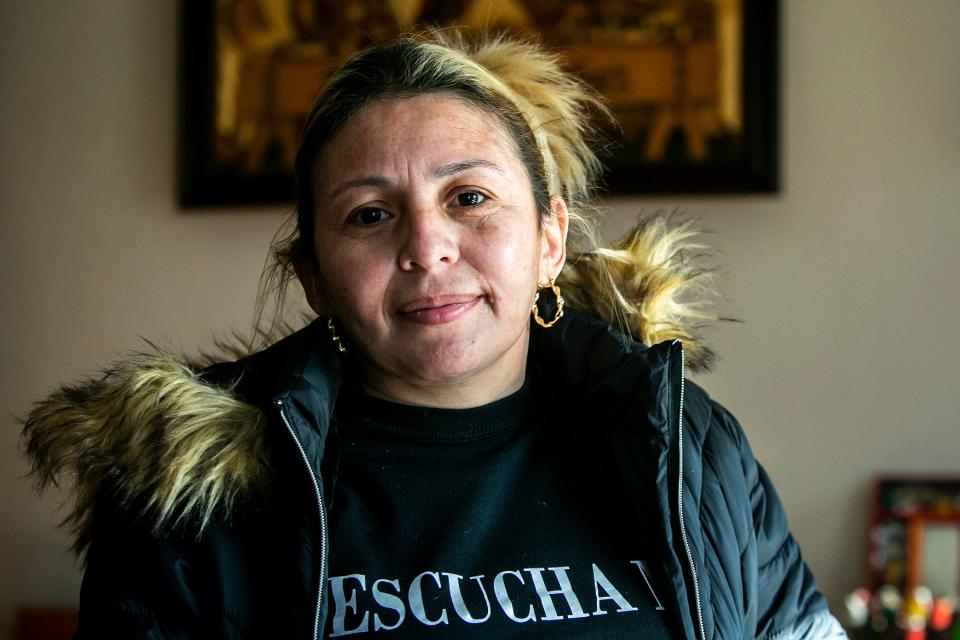 Ninoska Campos poses for a photo, Tuesday, Dec. 7, 2021, at the Catholic Worker House in Iowa City, Iowa.