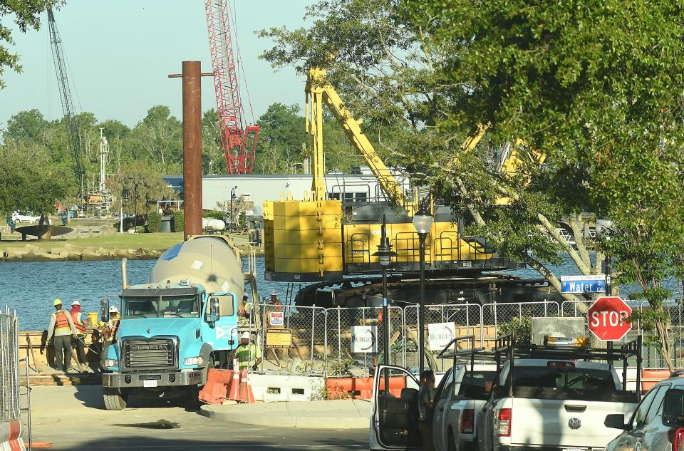 Crews continue to work at the corner of Water and Princess Streets along the riverwalk. Construction on Wilmington's riverwalk was supposed to wrap up this summer but appears to still be underway Friday June 24, 2022 in Wilmington, N.C.
