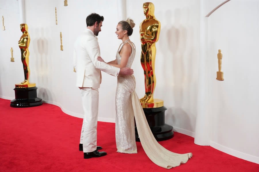 John Krasinski, left, and Emily Blunt arrive at the Oscars on Sunday, March 10, 2024, at the Dolby Theatre in Los Angeles. (Photo by Jordan Strauss/Invision/AP)
