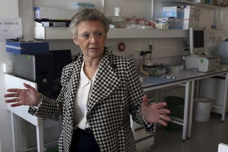 Francoise Barre-Sinoussi, French virologist and director of the Regulation of Retroviral Infections Division (Unite de Regulation des Infections Retrovirales) at the Institut Pasteur, gestures during an interview with Reuters, in Paris, France, October 1, 2015. REUTERS/Philippe Wojazer