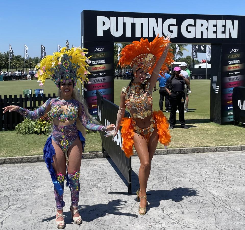 Samba Dancers by the putting green at LIV Golf Miami.