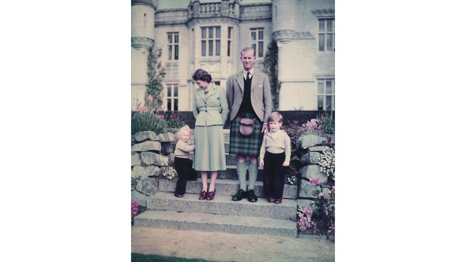 Queen Elizabeth II and The Prince Philip, Duke of Edinburgh with their two young children, Princess Anne and Prince Charles outside Balmoral Castle, 19th September 1952.