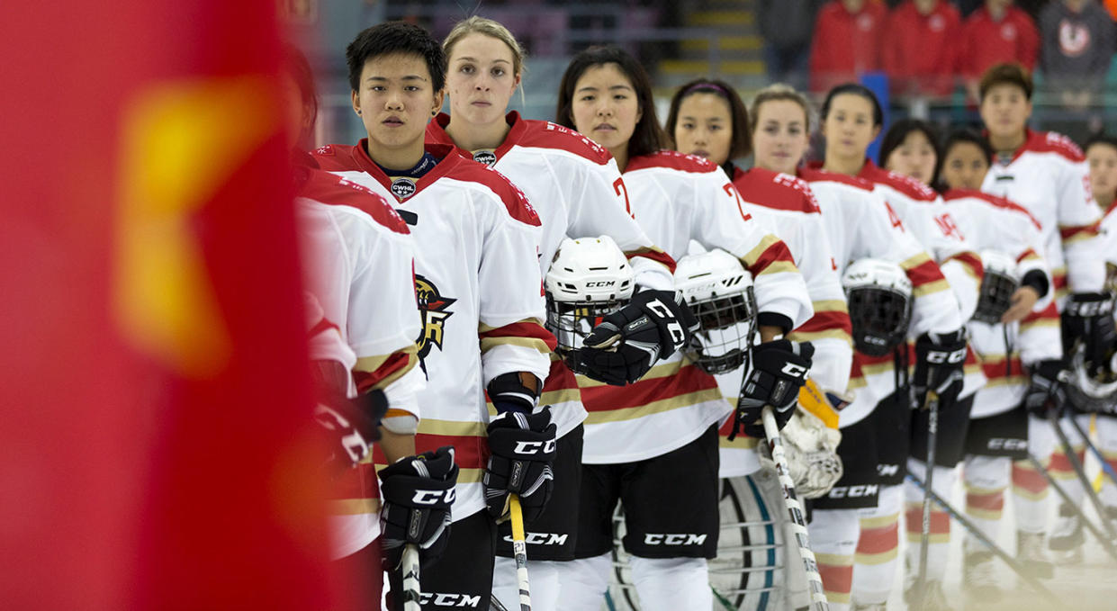 Kunlun Red Star players line up for the national anthems in Markham, Ont., on Oct. 21. (Chris Tanouye/CWHL)