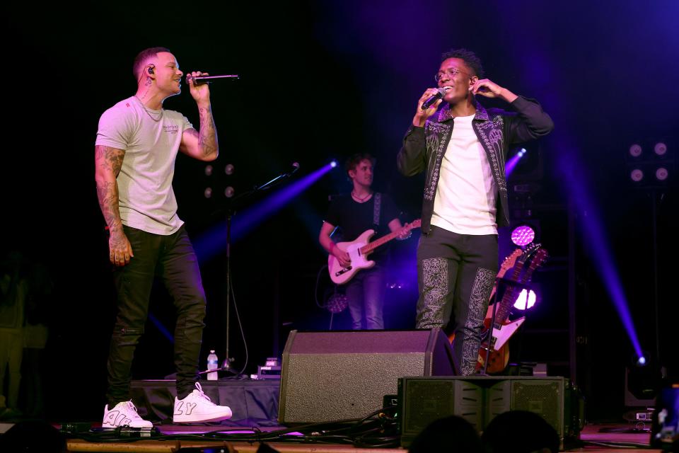 Kane Brown and BRELAND perform onstage for "BRELAND & Friends" concert to benefit the Oasis Center, sponsored by Amazon Music at Ryman Auditorium on April 12, 2022 in Nashville, Tennessee. (Photo by Jason Kempin/Getty Images for "BRELAND & Friends" )