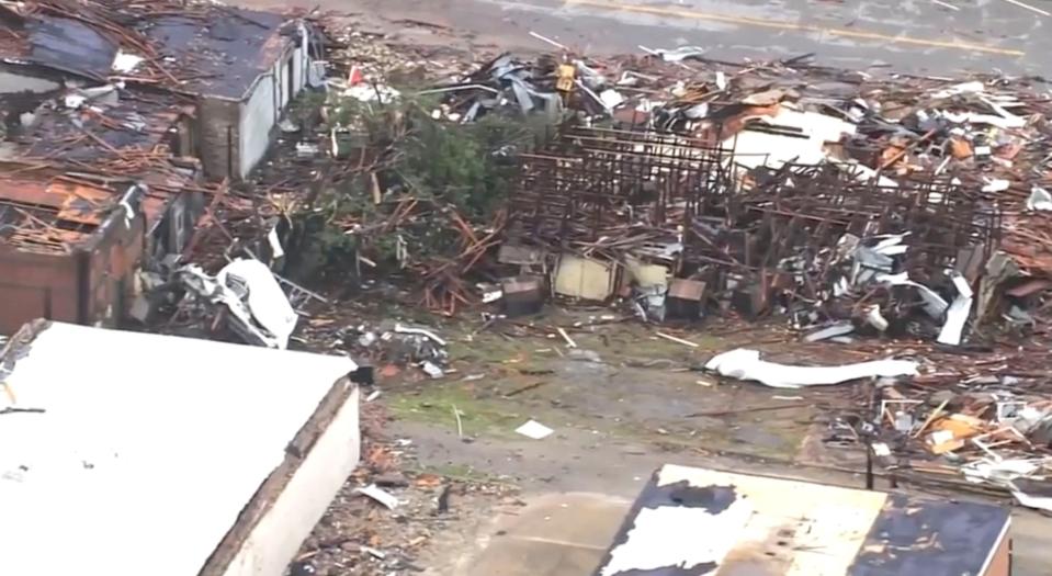 This image taken from video provided by KOCO shows buildings destroyed by a tornado in Sulphur, Okla., Sunday, April 28, 2024. (KOCO via AP)