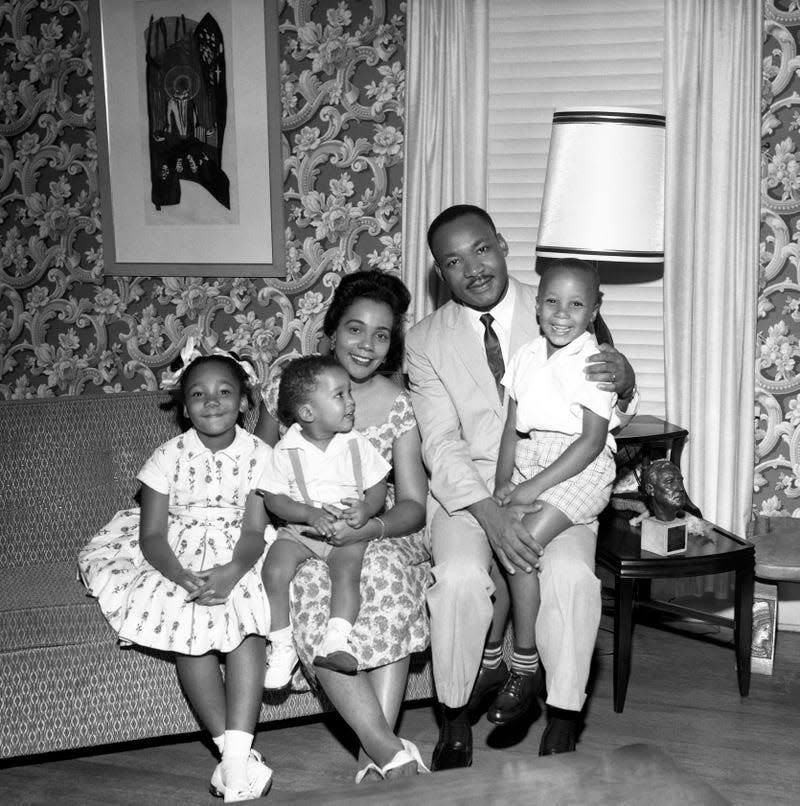 American Baptist minister and activist Martin Luther King Jr. (1929 - 1968) poses for a family portrait with his daughter, 7-year-old Yolanda Denise King (1955 - 2007), son, 18 months Dexter Scott King, wife American author, activist, and civil rights leader Coretta Scott King (1927 - 2006) and son, 4-year-old Martin Luther King III at their home in Atlanta, Georgia, July 1962. 