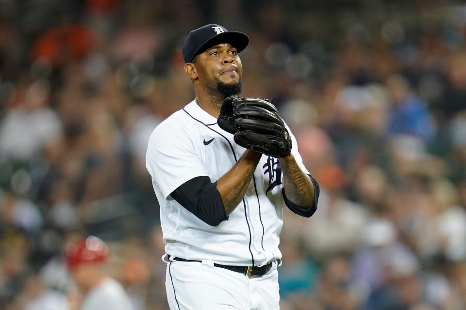 Detroit Tigers relief pitcher Jose Cisnero walks to the dugout against the Los Angeles Angels in the eighth inning of a baseball game in Detroit, Wednesday, Aug. 18, 2021.