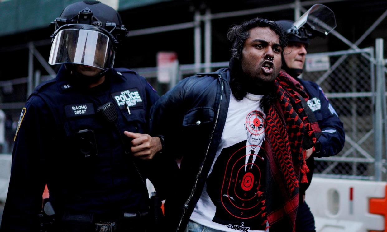 <span>A man is detained by law enforcement as pro-Palestinian demonstrators attend a protest near the Met Gala, in New York City, Monday evening.</span><span>Photograph: Eduardo Muñoz/Reuters</span>