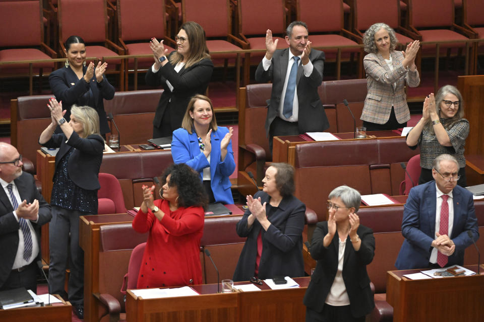 Labor senators applaud after the passing of the Voice to Parliament in the Senate chamber at Australia's Parliament House, in Canberra, Monday, June 19, 2023. The Senate voted to hold a referendum this year on creating an Indigenous Voice to Parliament, an advocate aiming to give the nation's most disadvantaged ethnic minority more say on government policy. (Mick Tsikas/AAP Image via AP)