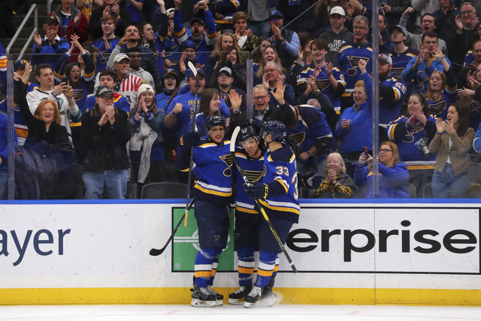 St. Louis Blues winger Jaden Schwartz (17) celebrates his goal against the Winnipeg Jets with Blues' Brayden Schenn (10) and St. Louis Blues center Jordan Kyrou (33) during the second period of an NHL hockey game Sunday, Dec. 29, 2019, in St. Louis. (AP Photo/Dilip Vishwanat)