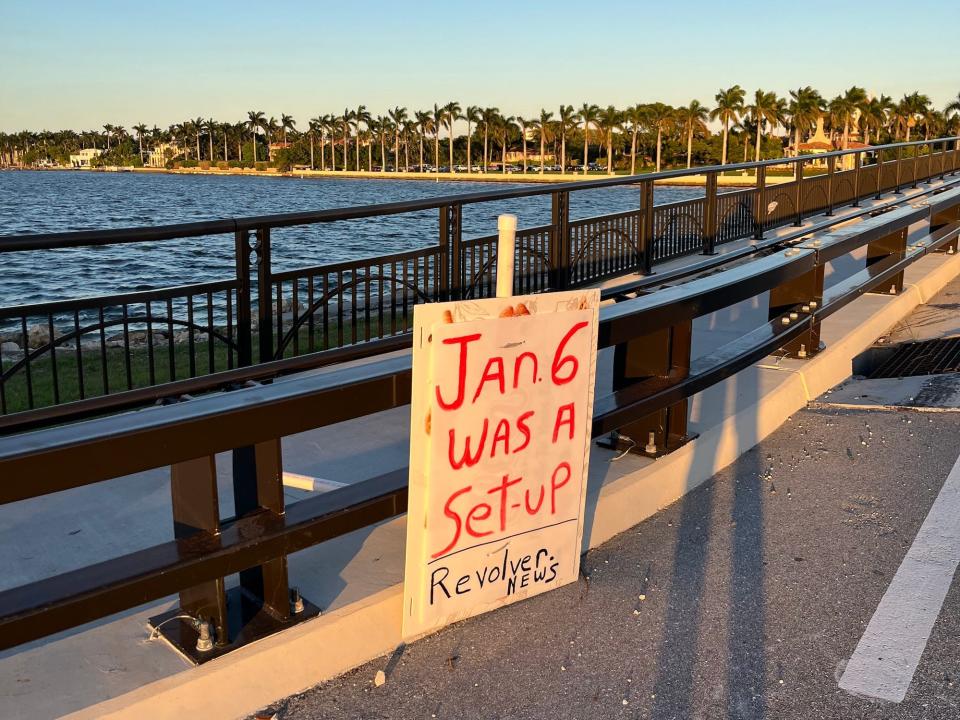 Sign outside Mar-a-Lago on the second anniversary of the January 6 attack on the Capitol.