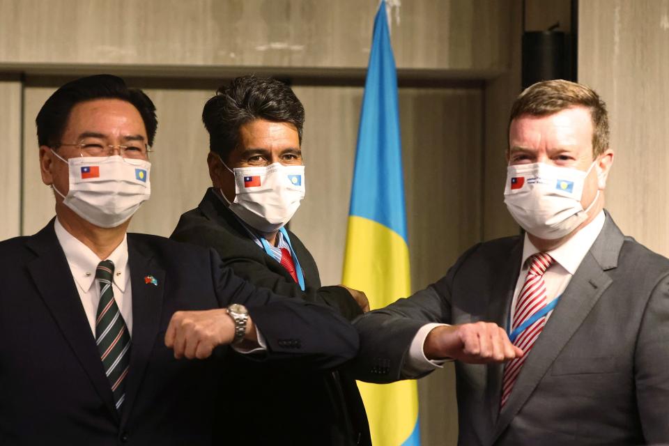 <p>Palau President Surangel Whipps, Taiwan foreign minister Joseph Wu and US Ambassador to Palau John Hennessey-Niland attend a news conference in Taipei, Taiwan on 29 March, 2021</p> (Reuters)
