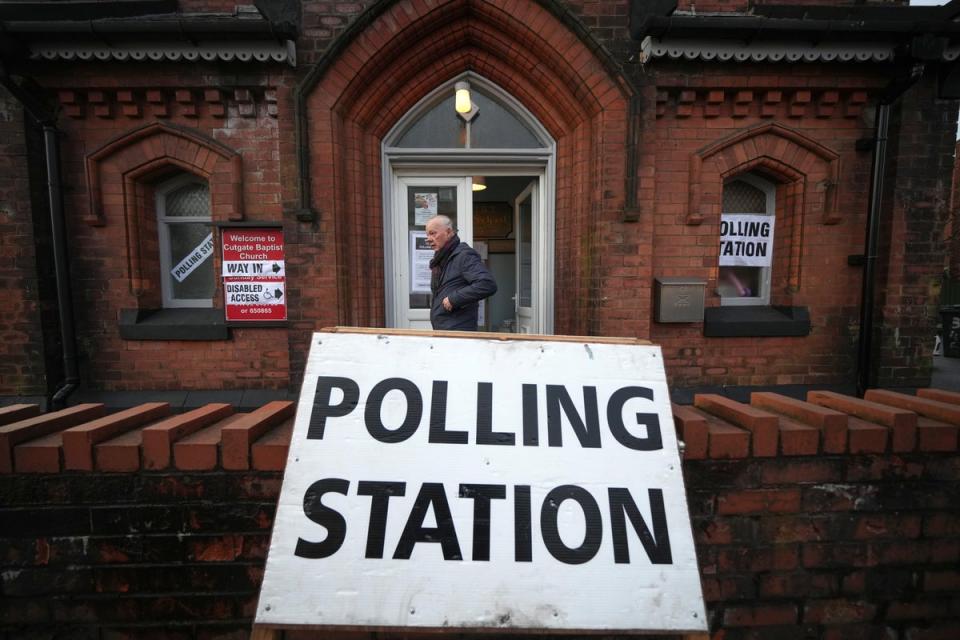 A voter leaves a polling station in Rochdale where the by-election has been marred with controversary (Getty Images)