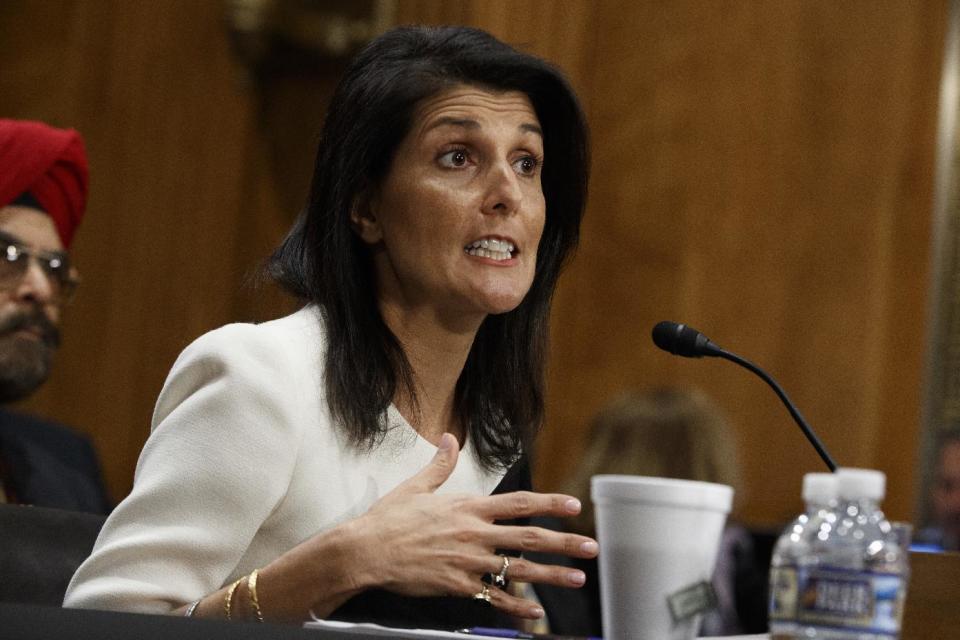 FILE - In this Jan. 18, 2017 file photo, UN Ambassador-designate, South Carolina Gov. Nikki Haley testifies on Capitol Hill in Washington at her confirmation hearing before the Senate Foreign Relations Committee. The Senate Foreign Relations Committee has overwhelmingly approved Haley's nomination to be U.S. ambassador to the United Nations. (AP Photo/Evan Vucci, File)